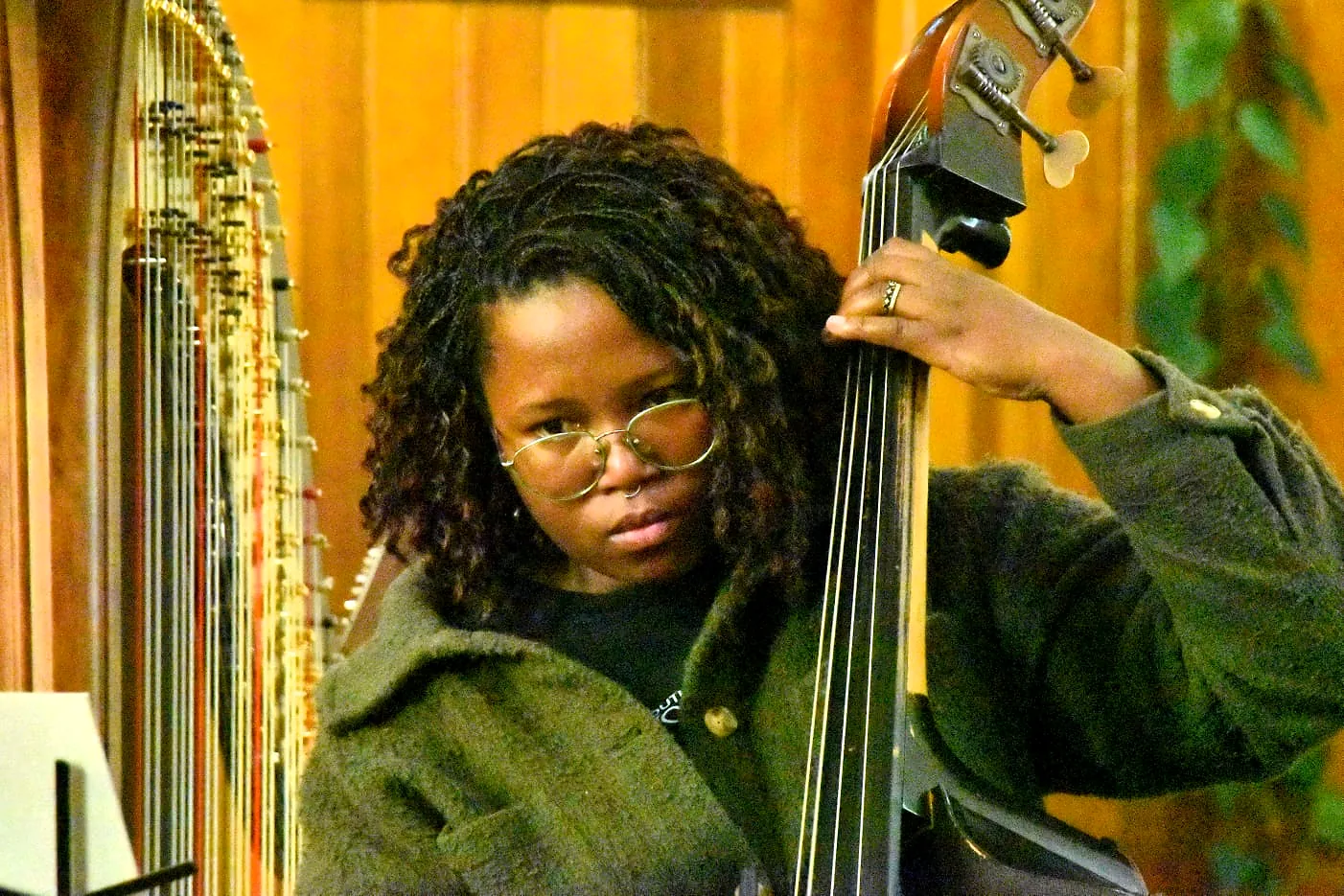 Double bassist performing with the ensemble