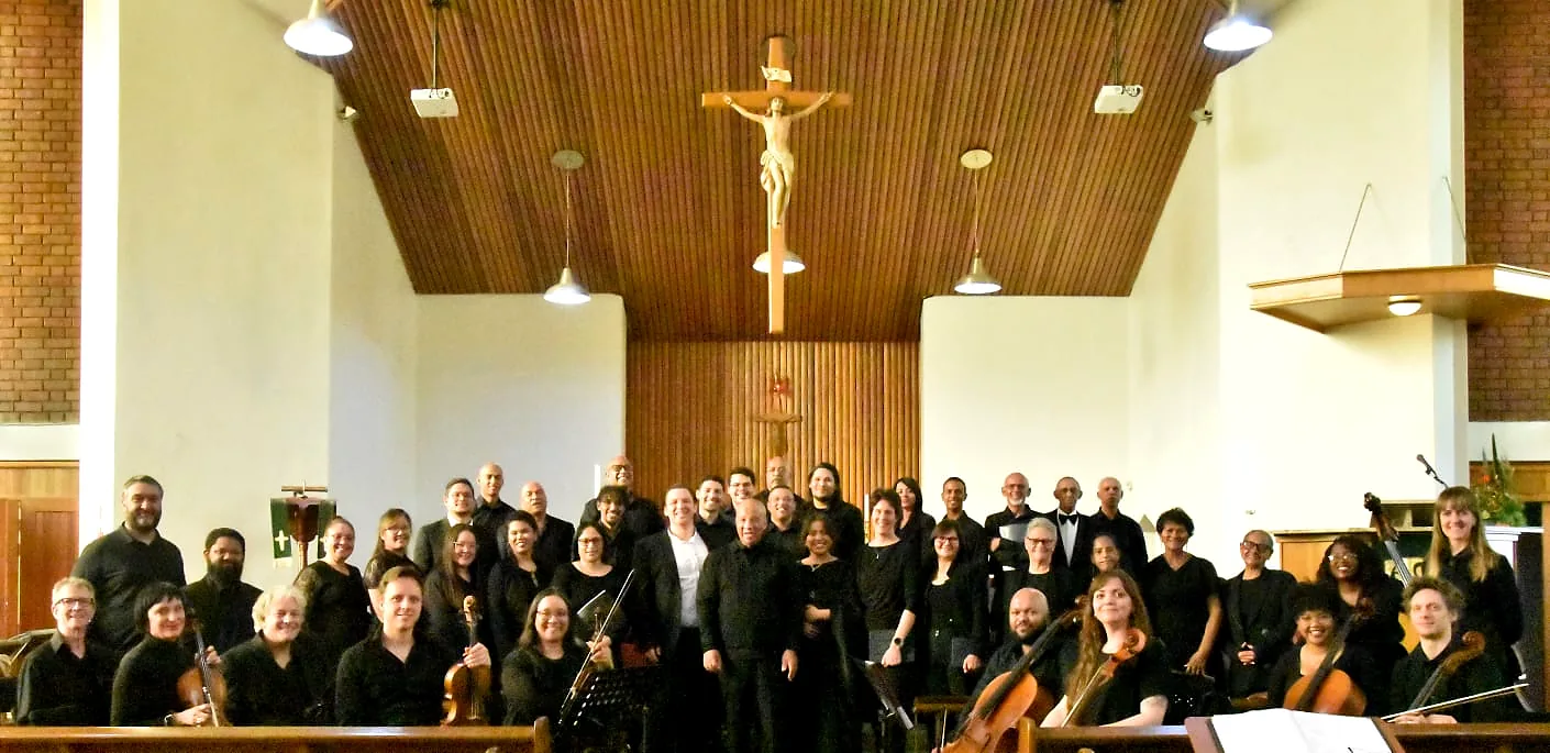 St. Luke’s Chorale and instrumentalists gathered after a performance